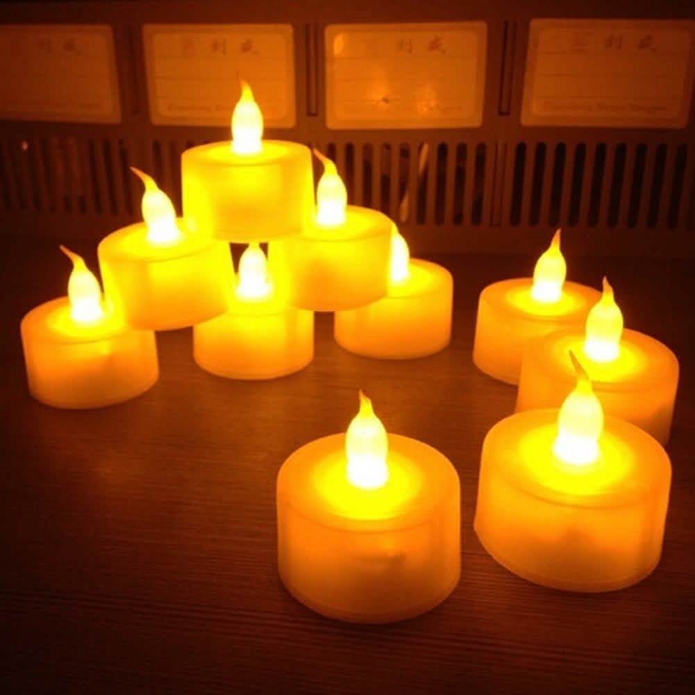 12-Pack: Flameless LED Tealight Candles, Battery Operated