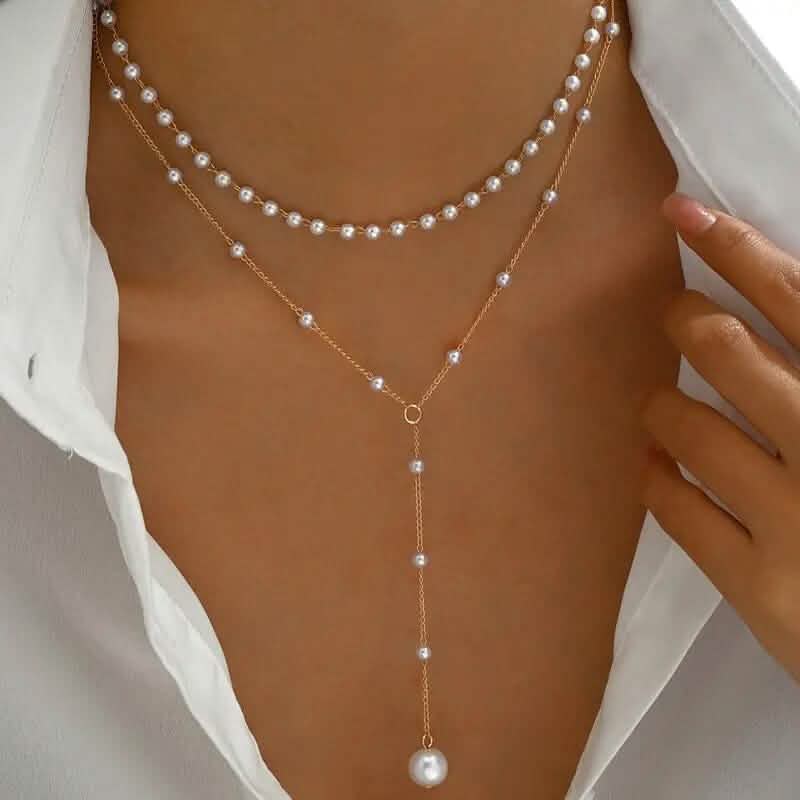 Elegant Vintage Style Double-Layer Pendant Necklace with Imitation Pearl Accents and Tassel Drop